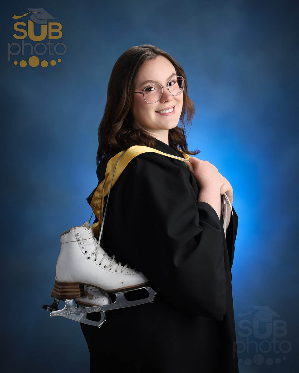 U of A graduate with her figure skates