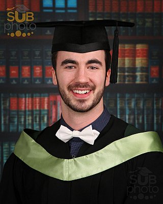 Grad photo wearing a white bowtie